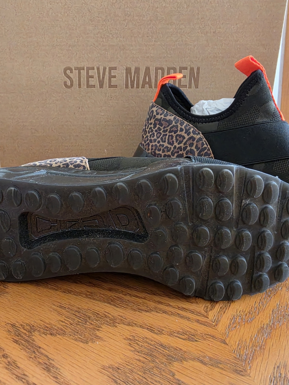Steve Madden Black and Orange Leopard Slip-On Sneakers
